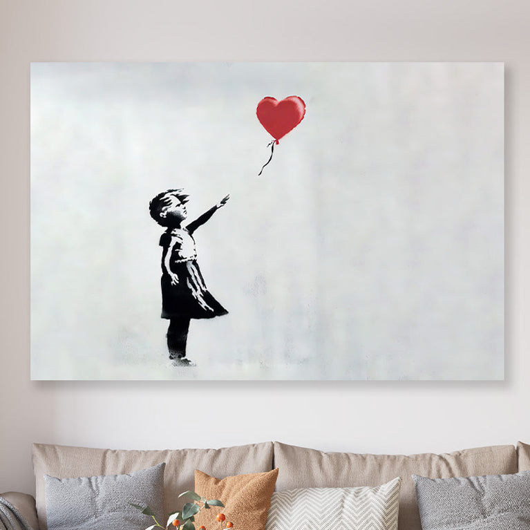 Girl with heart baloon Bansky