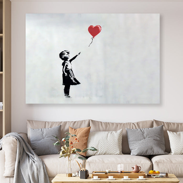 Girl with heart baloon Bansky